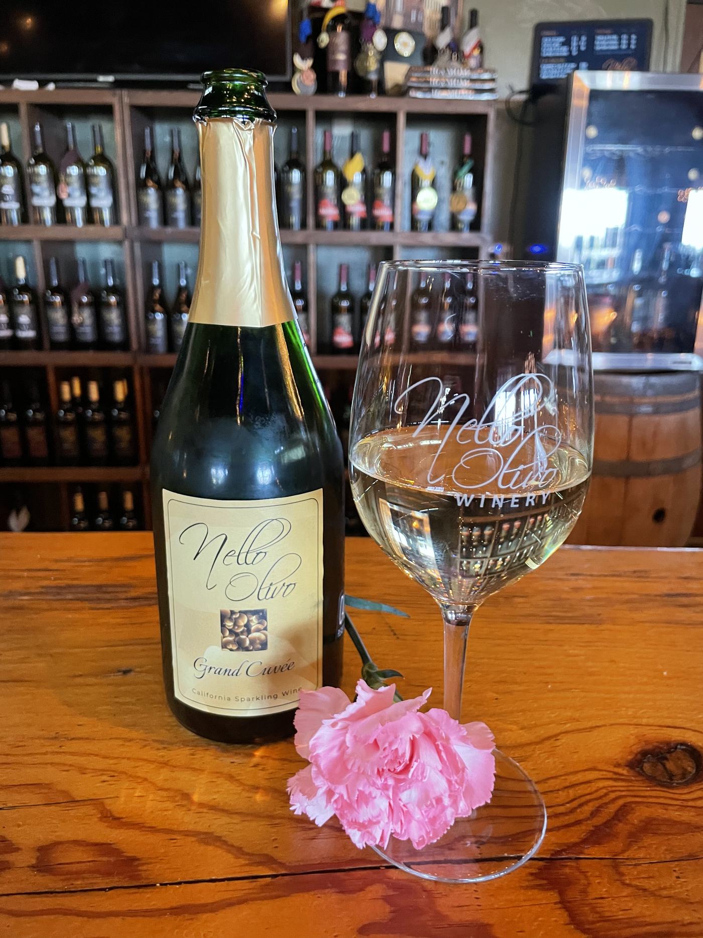 A bottle and a peony on the cellar bar