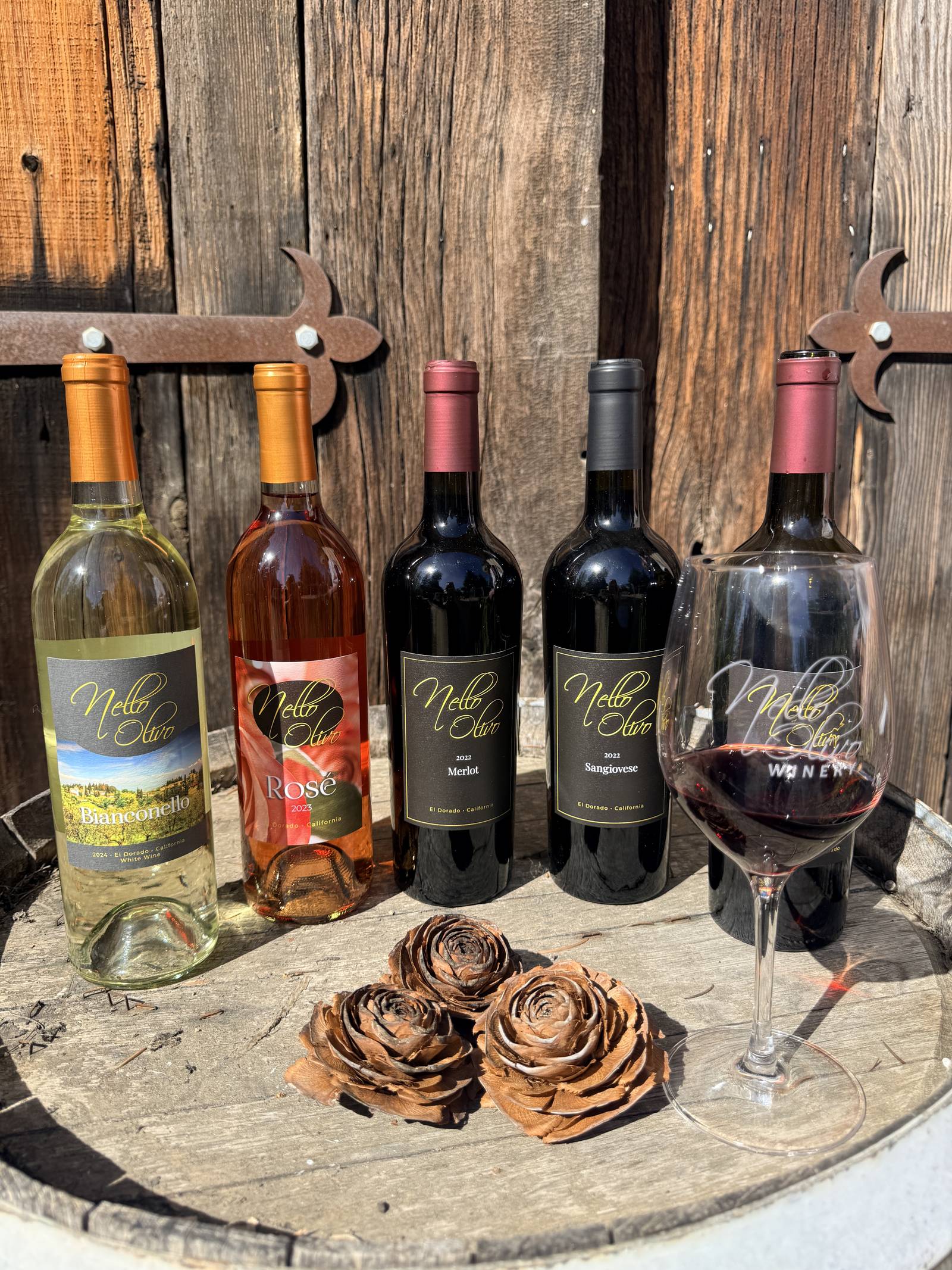 Five wines on a barrel outside the Camino room