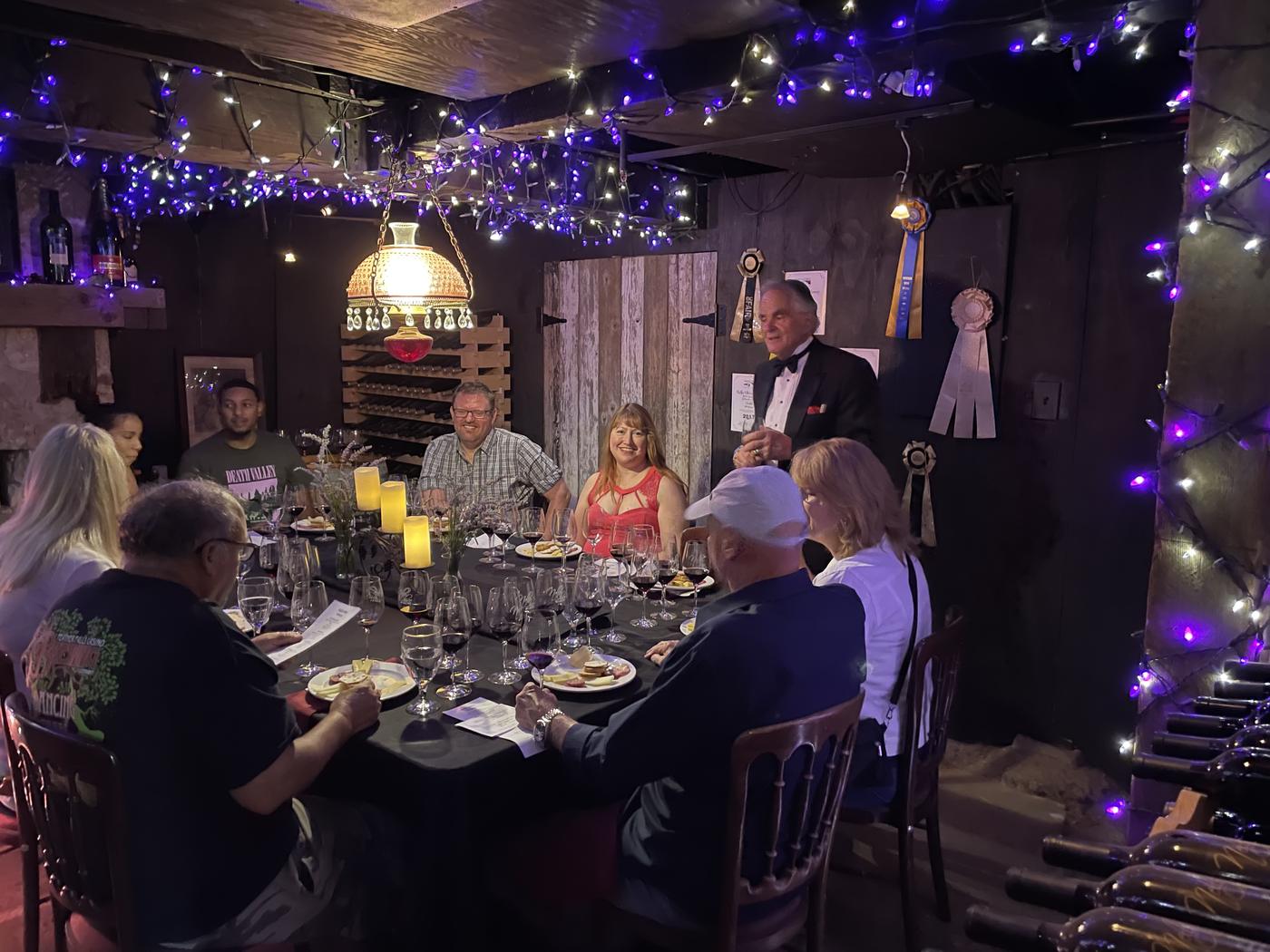 Dinner under the purple lights in the cellar
