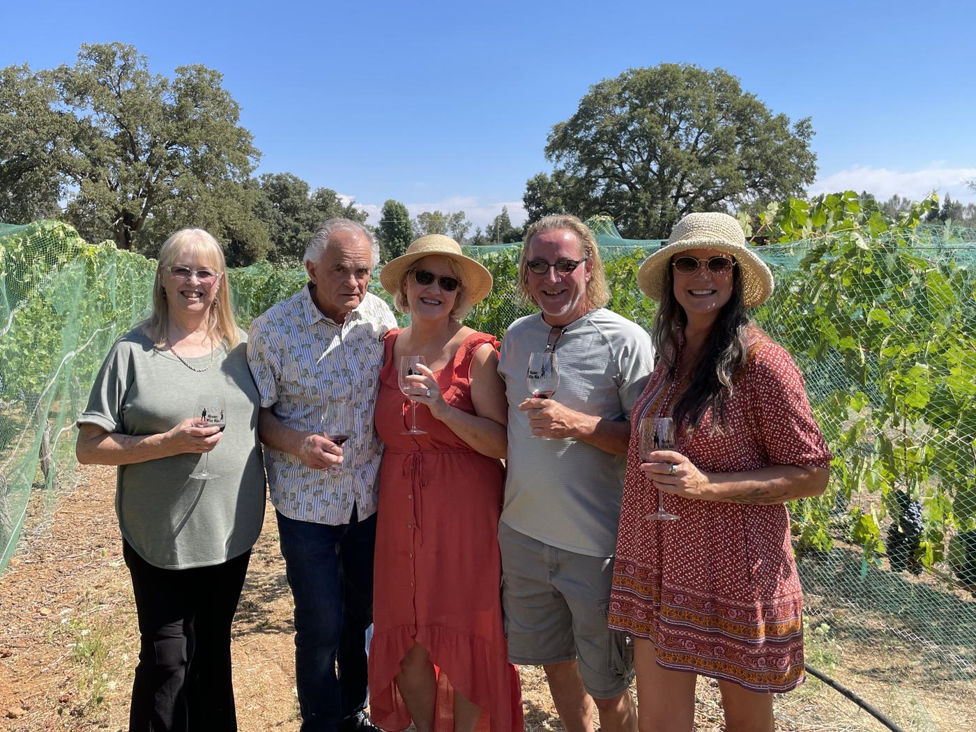 Members among the vines at Rancho Olivo