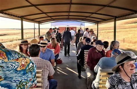The Wine Mob on the covered wagon ride through the fields