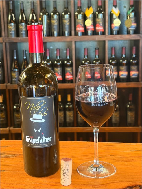 The Grapefather and a glass on the bar at Camino
