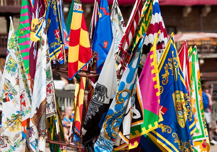Colorful flags of the contrade at Il Palio