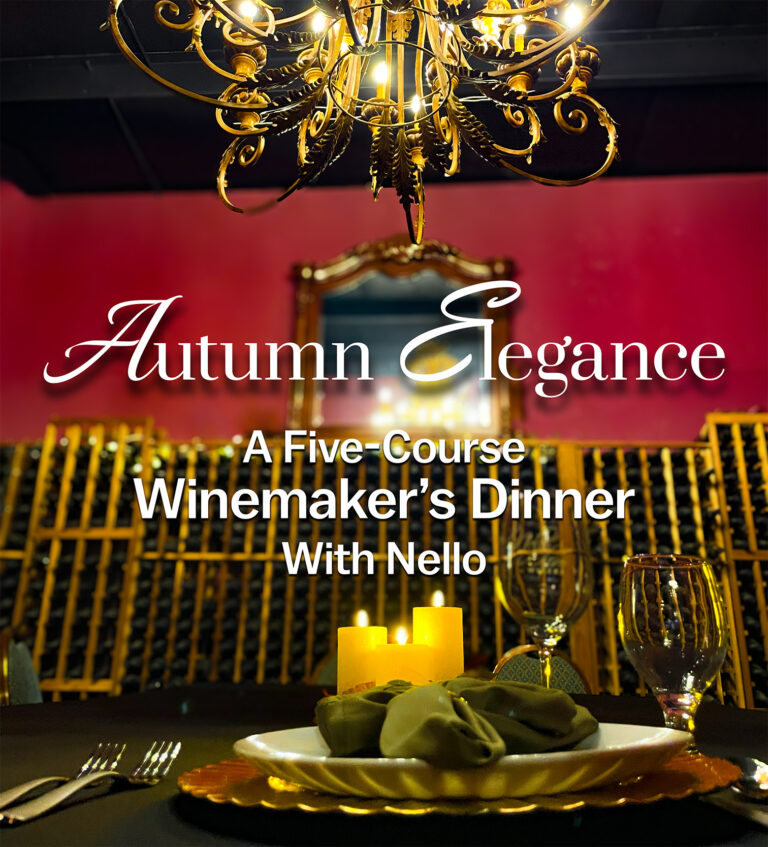 Table setting with candles and chandelier.